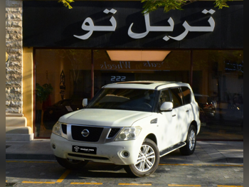 نيسان  باترول  اس اي  2013  اوتوماتيك  350,000 كم  8 سلندر  دفع رباعي  اس يو في  أبيض