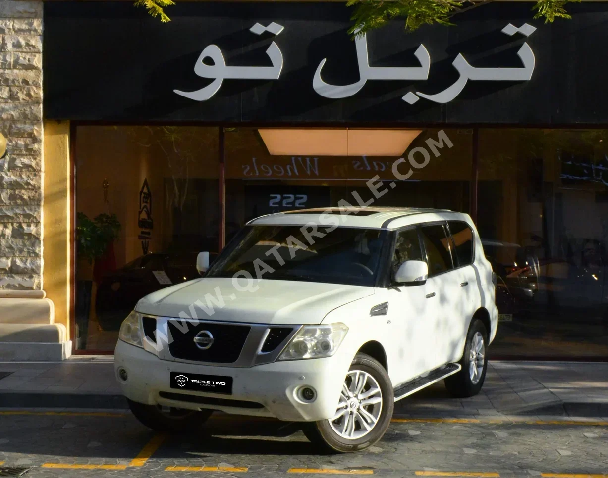 نيسان  باترول  اس اي  2013  اوتوماتيك  350,000 كم  8 سلندر  دفع رباعي  اس يو في  أبيض