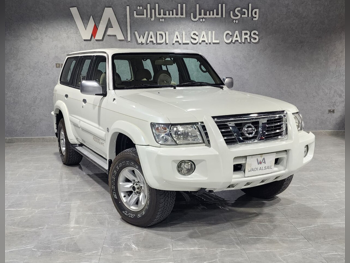 نيسان  باترول  سفاري  2004  عادي  262,000 كم  6 سلندر  دفع رباعي  اس يو في  أبيض