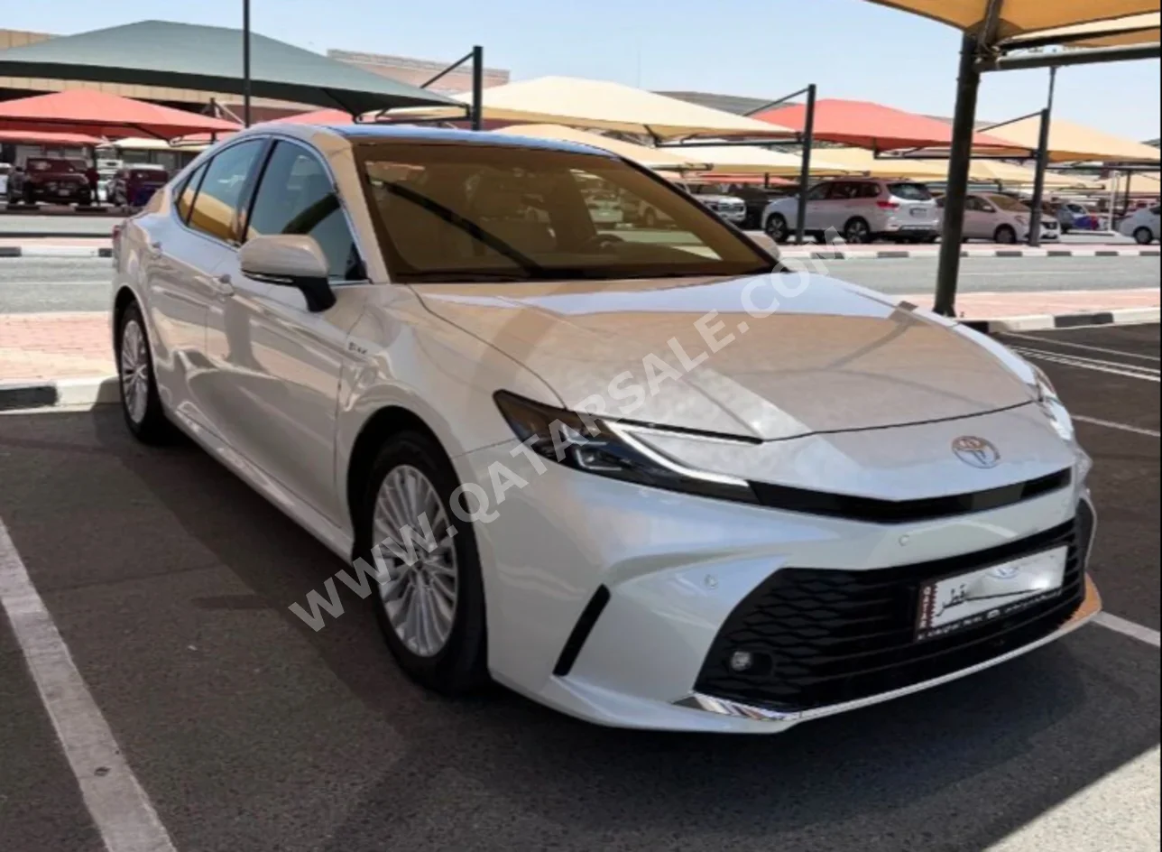 Toyota  Camry  Hybrid  2025  Automatic  22,000 Km  4 Cylinder  Front Wheel Drive (FWD)  Sedan  White  With Warranty