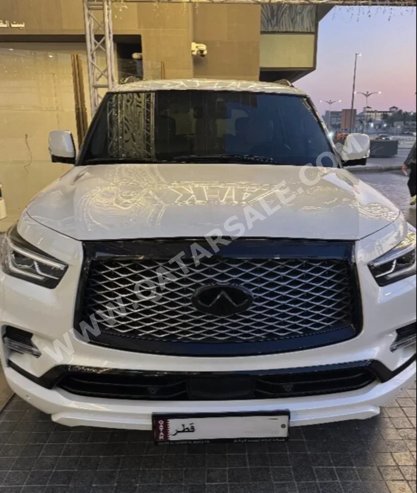 Infiniti  QX  80  2021  Automatic  59,000 Km  8 Cylinder  Four Wheel Drive (4WD)  SUV  White  With Warranty