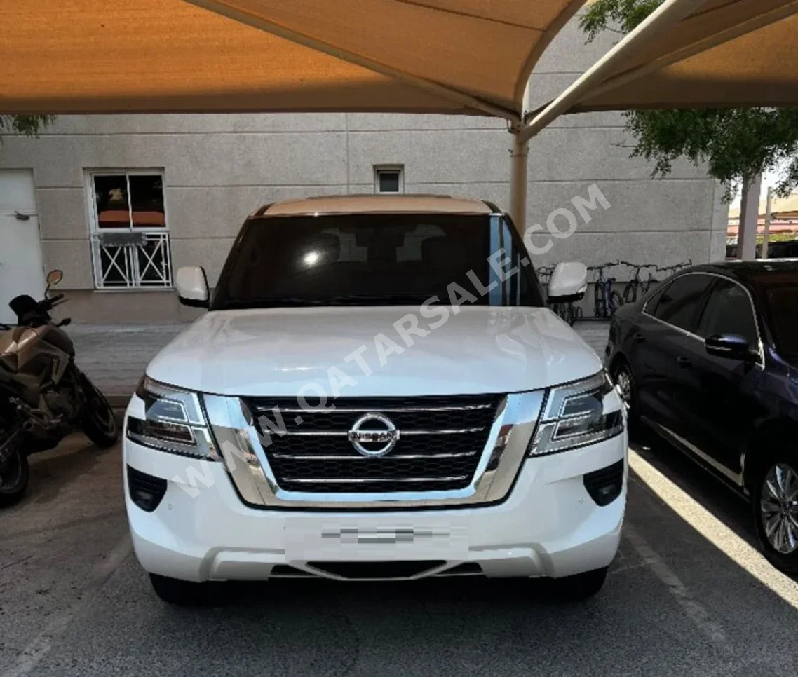Nissan  Patrol  LE  2020  Automatic  53,000 Km  8 Cylinder  Four Wheel Drive (4WD)  SUV  White