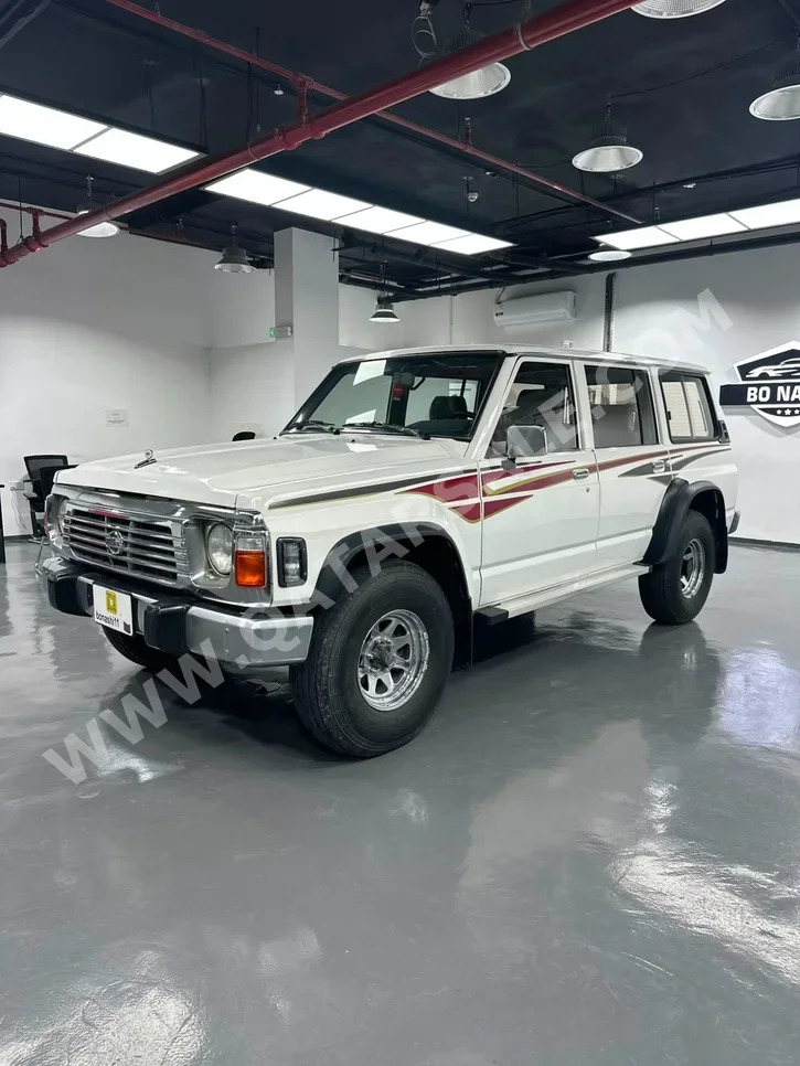 نيسان  باترول  جي ال  1997  عادي  555,000 كم  6 سلندر  دفع رباعي  اس يو في  أبيض