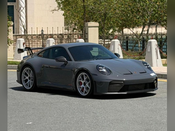 بورش 911 جي تي 3 ار اس - وايساخ باكج 2026 عادي 4,000 كم 6 سلندر دفع خلفي كوبيه \ سبورت رمادي تحت الضمان