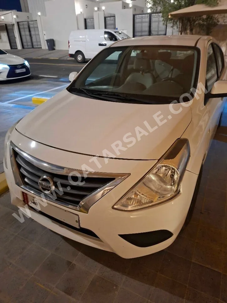 Nissan  Sunny  2021  Automatic  140,000 Km  4 Cylinder  Front Wheel Drive (FWD)  Sedan  White