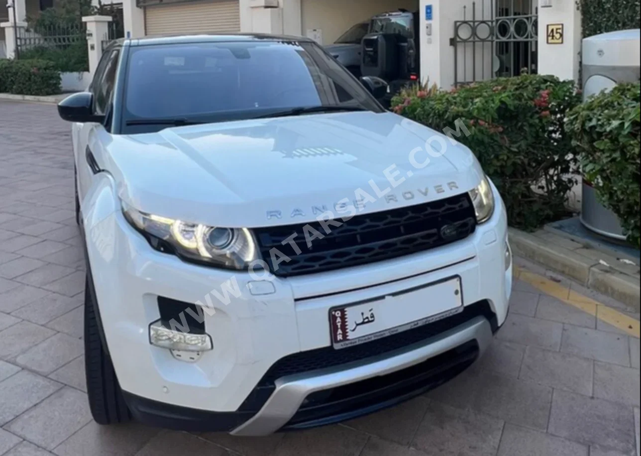Land Rover  Evoque  Dynamic  2015  Automatic  105,000 Km  4 Cylinder  Four Wheel Drive (4WD)  SUV  White