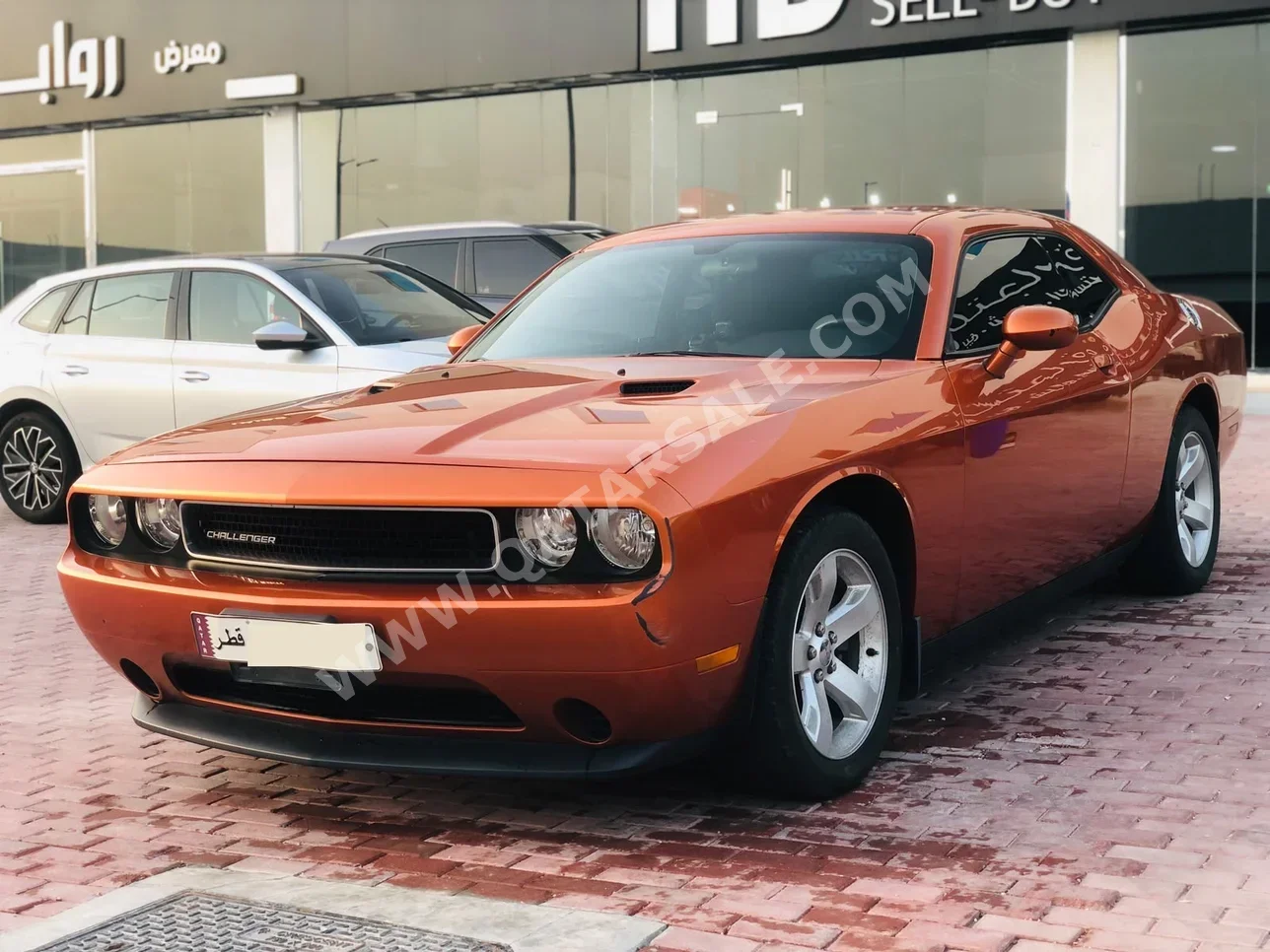 دودج تشارجر 2011 اوتوماتيك 74,000 كم 6 سلندر دفع خلفي سيدان برتقالي