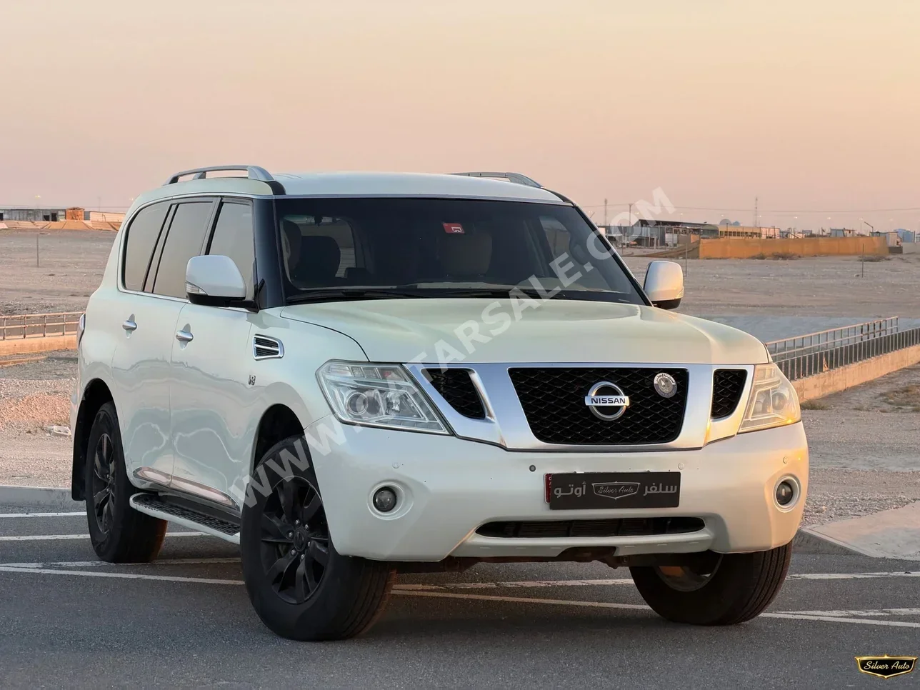Nissan Patrol XE 2013 Automatic 229,000 Km 6 Cylinder Four Wheel Drive (4WD) SUV White