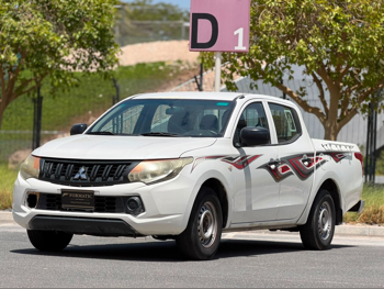 Mitsubishi  L 200  2017  Manual  187,000 Km  4 Cylinder  Rear Wheel Drive (RWD)  Pick Up  Pearl