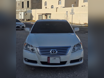 تويوتا أفالون لمتيد 2008 اوتوماتيك 148,000 كم 6 سلندر سحب امامي سيدان أبيض