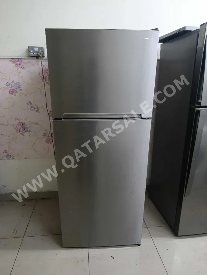 ثلاجة بفريزر علوي