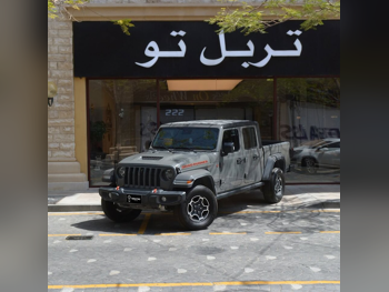 جييب جلاديتور 2021 اوتوماتيك 401,500 كم 6 سلندر دفع رباعي بيكب رمادي