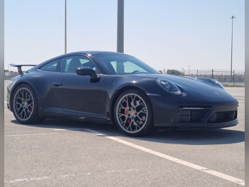 Porsche  911  Carrera S  2022  Automatic  14,300 Km  6 Cylinder  Rear Wheel Drive (RWD)  Coupe / Sport  Black