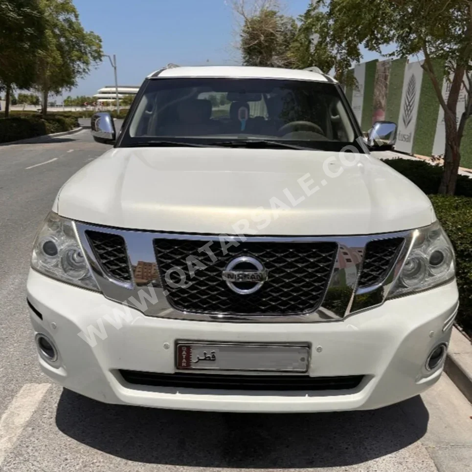 Nissan Patrol LE 2012 Automatic 250,000 Km 8 Cylinder Four Wheel Drive (4WD) SUV Pearl