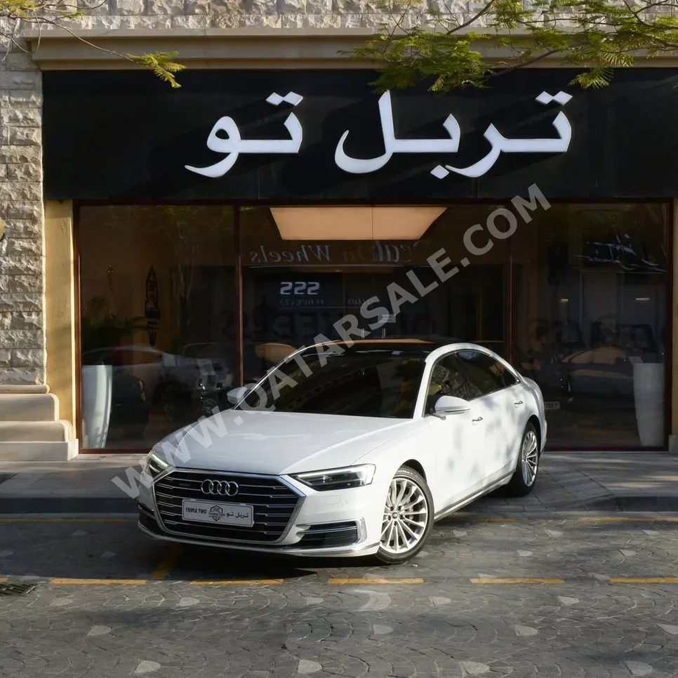 اودي أي 8 أل 2019 اوتوماتيك 78,180 كم 6 سلندر دفع كلي مستمر سيدان أبيض