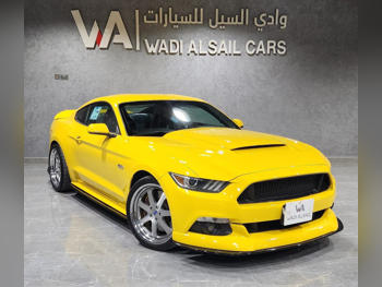 Ford  Mustang  GT  2015  Manual  169,000 Km  8 Cylinder  Rear Wheel Drive (RWD)  Coupe / Sport  Yellow