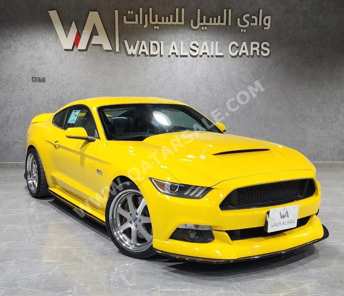 فورد موستانغ جي تي 2015 عادي 169,000 كم 8 سلندر دفع خلفي كوبيه \ سبورت أصفر