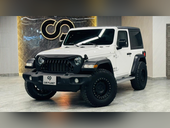 Jeep  Wrangler  Sport  2019  Automatic  165,000 Km  6 Cylinder  Four Wheel Drive (4WD)  SUV  White