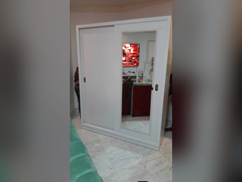 خزائن ودواليب الملابس والزينة - دوحة فيرنيتشر - خزائن - أبيض