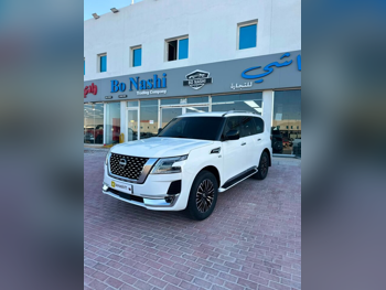 Nissan  Patrol  XE  2014  Automatic  296,000 Km  8 Cylinder  Four Wheel Drive (4WD)  SUV  White