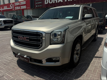 GMC  Yukon  XL SLT  2016  Automatic  345,000 Km  8 Cylinder  Four Wheel Drive (4WD)  SUV  Gold