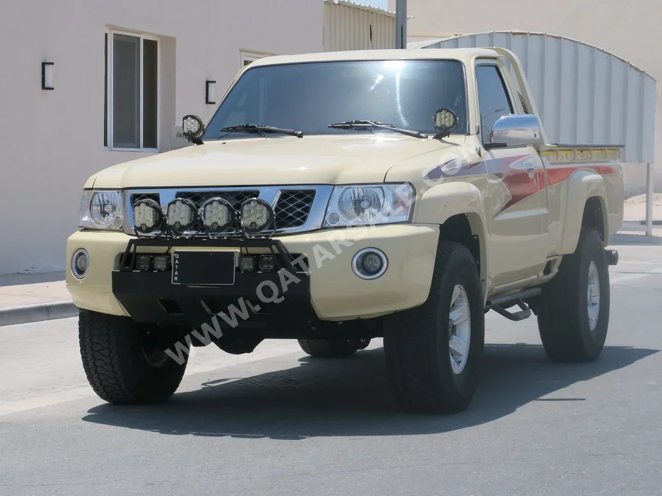 Nissan Patrol Pickup 2014 Manual 145,000 Km 6 Cylinder Four Wheel Drive (4WD) Pick Up Beige