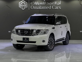 نيسان  باترول  بلاتنيوم  2014  اوتوماتيك  257,000 كم  8 سلندر  دفع رباعي  اس يو في  أبيض
