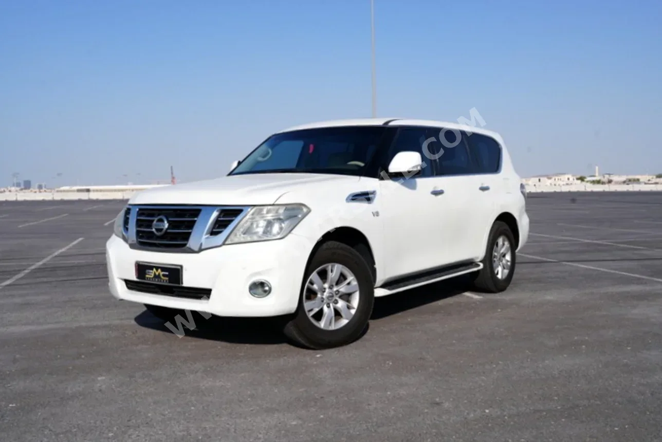 Nissan  Patrol  SE  2012  Automatic  273,000 Km  8 Cylinder  Four Wheel Drive (4WD)  SUV  White