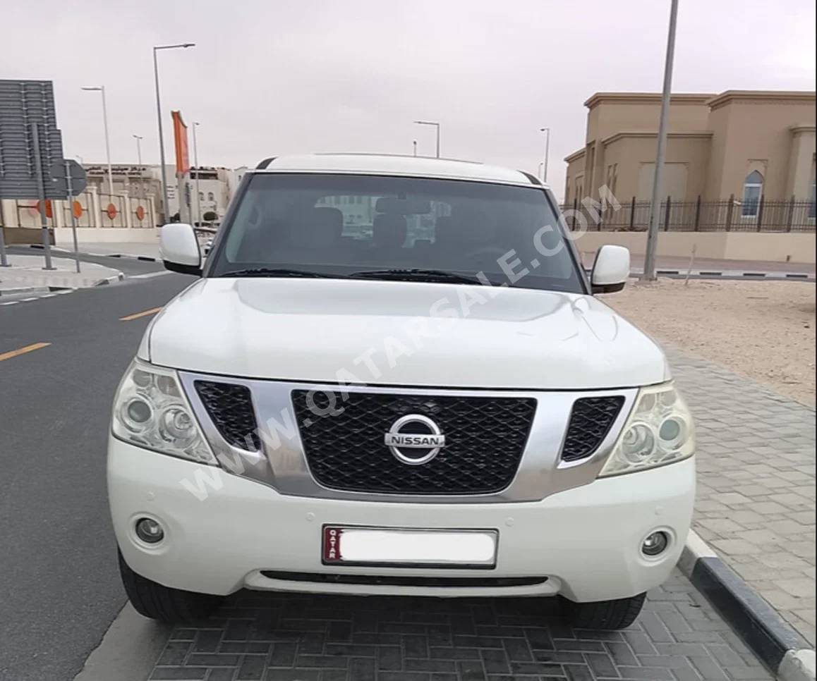 نيسان  باترول  اس اي  2013  اوتوماتيك  286,000 كم  8 سلندر  دفع رباعي  اس يو في  أبيض
