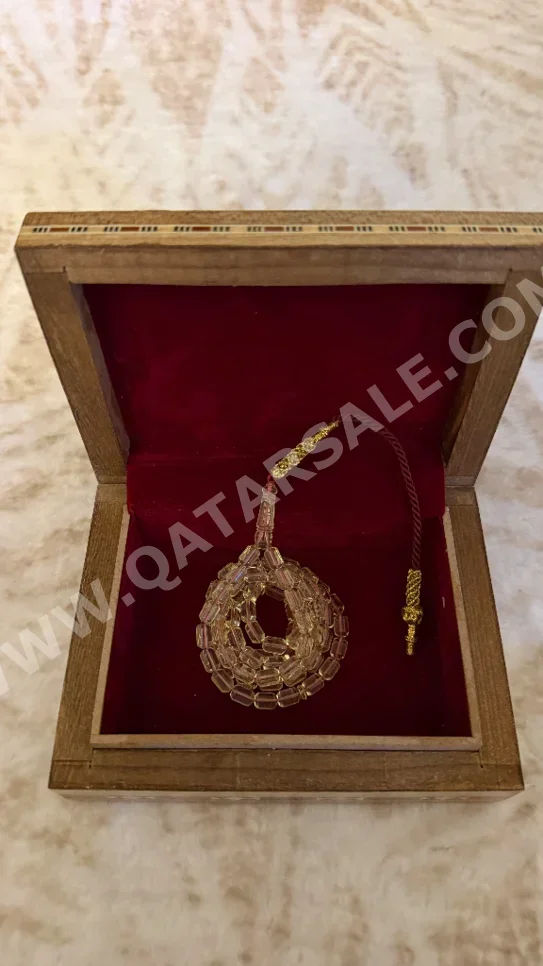 مسبحة كهرمان أبيض قطر مستطيل 6 ملي 99 15 غرام