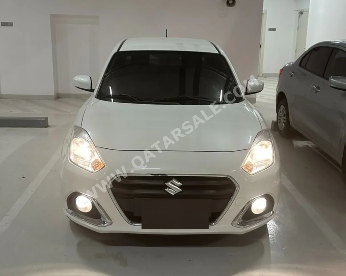 سوزوكي ديزاير 2024 اوتوماتيك 39,000 كم 4 سلندر سحب امامي سيدان أبيض تحت الضمان