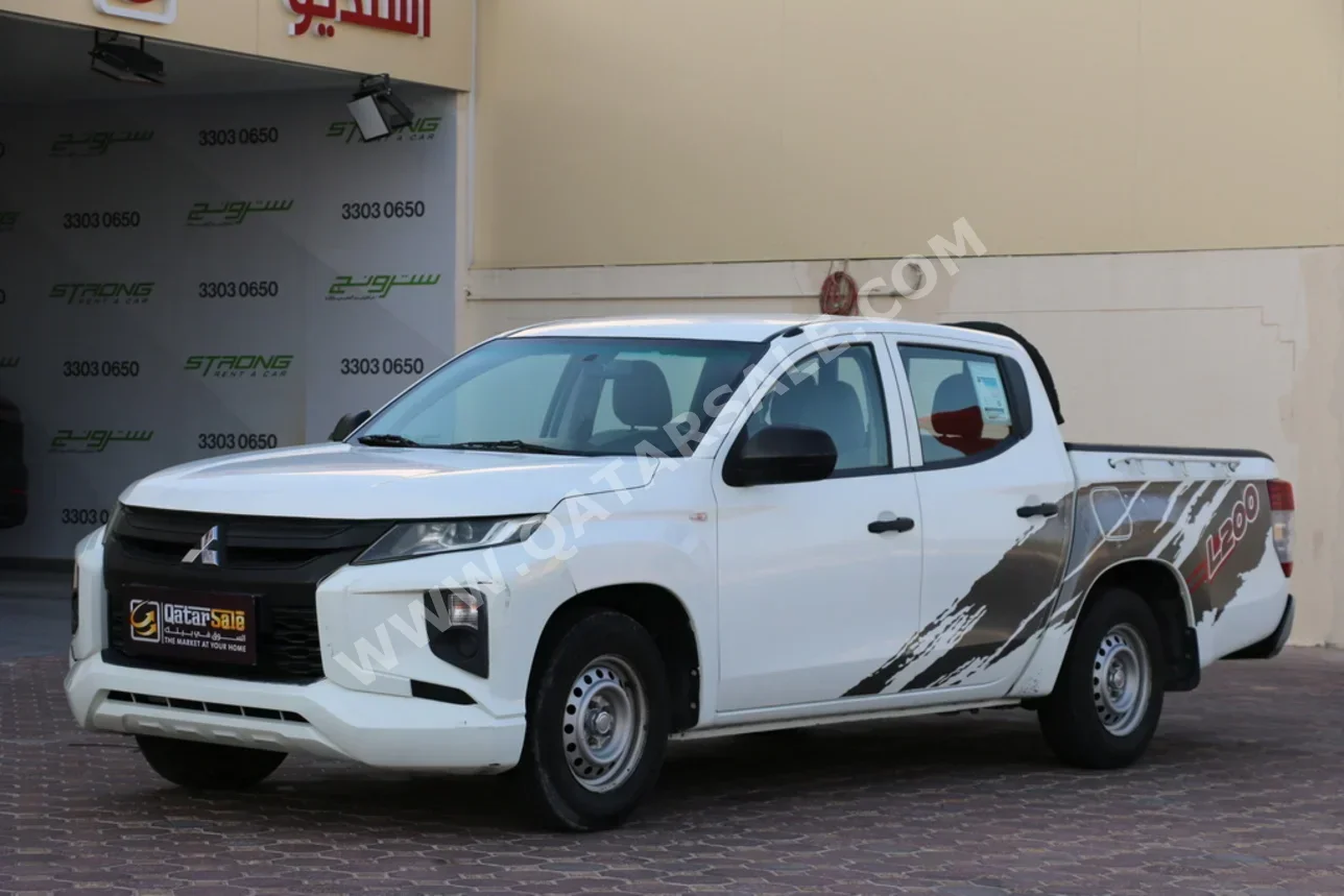 Mitsubishi  L 200  Diesel  2020  Manual  270,000 Km  4 Cylinder  Front Wheel Drive (FWD)  Pick Up  White