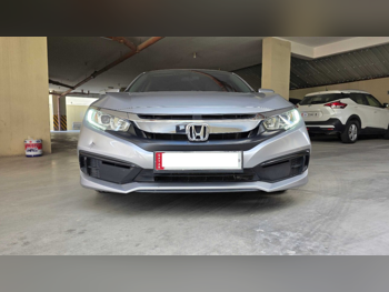 Honda Civic LXI 2021 Automatic 99,000 Km 4 Cylinder Front Wheel Drive (FWD) Sedan Silver