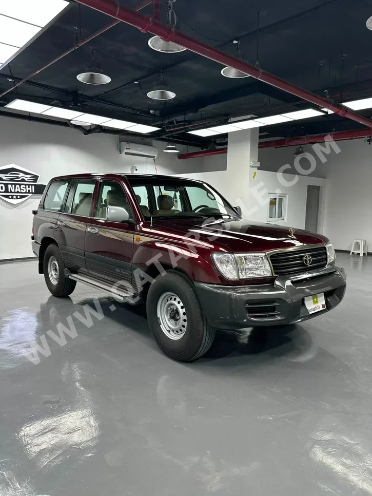 تويوتا لاند كروزر جي اكس ار 2002 عادي 320,000 كم 6 سلندر دفع رباعي اس يو في أحمر
