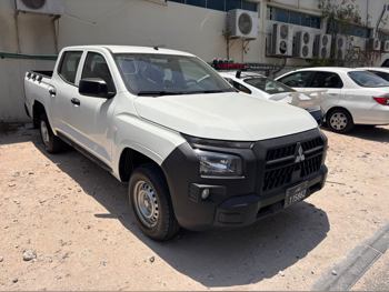 Mitsubishi  L 200  2024  Manual  39,000 Km  4 Cylinder  Rear Wheel Drive (RWD)  Pick Up  White