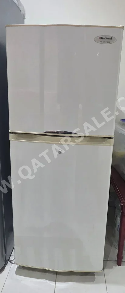 ثلاجة بفريزر علوي - أبيض
