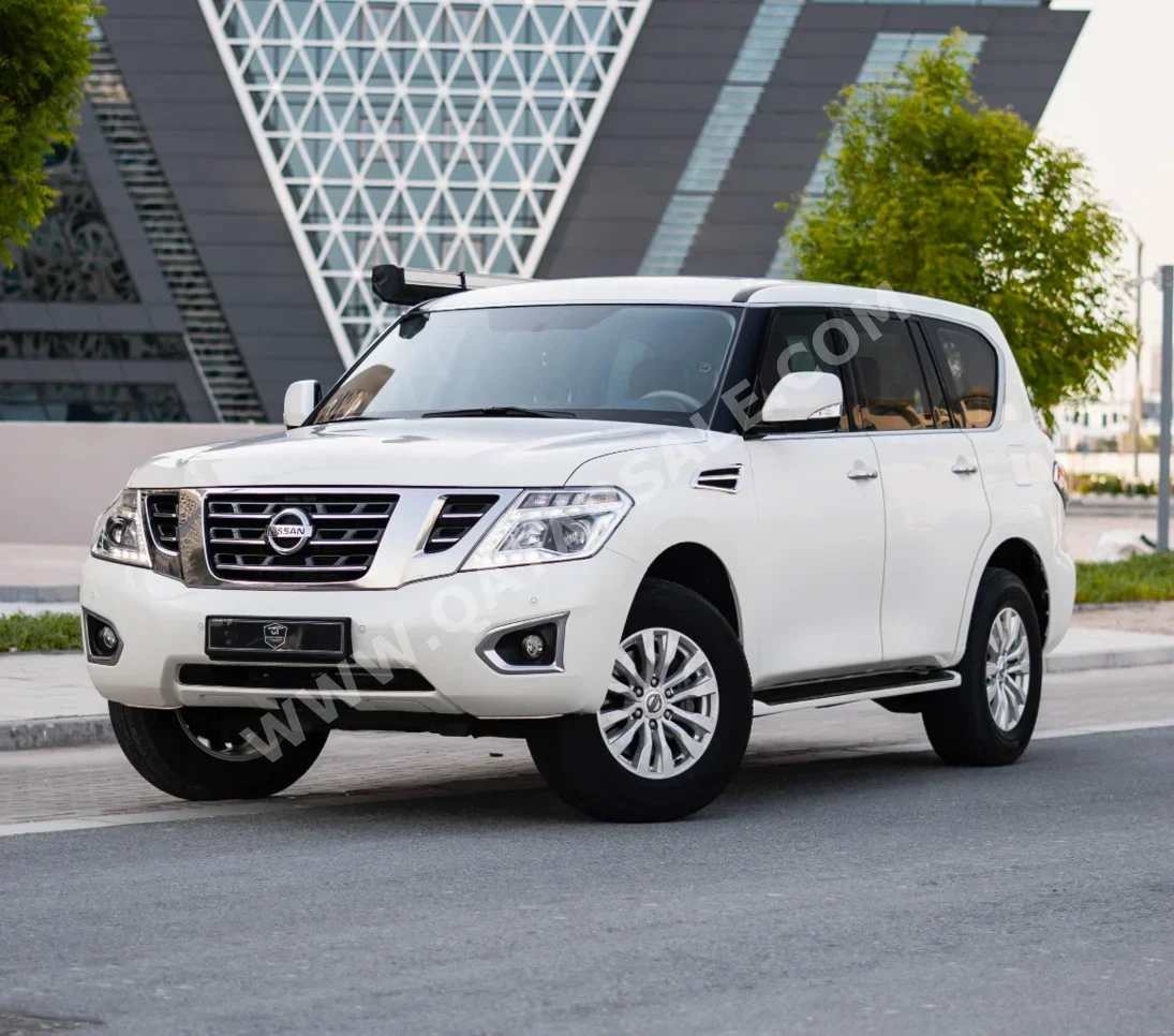 Nissan Patrol SE 2018 Automatic 75,000 Km 8 Cylinder Four Wheel Drive (4WD) SUV White and Black With Warranty