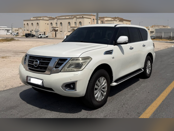 نيسان باترول اس اي 2015 اوتوماتيك 310,000 كم 8 سلندر دفع رباعي اس يو في أبيض