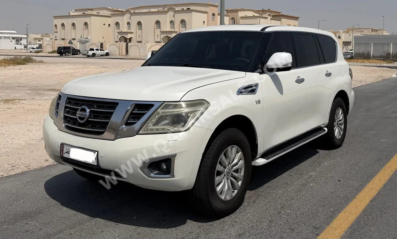 Nissan Patrol SE 2015 Automatic 310,000 Km 8 Cylinder Four Wheel Drive (4WD) SUV White