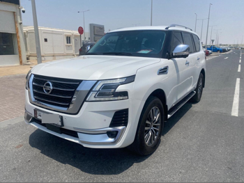 Nissan  Patrol  Platinum  2020  Automatic  105,420 Km  8 Cylinder  Four Wheel Drive (4WD)  SUV  White