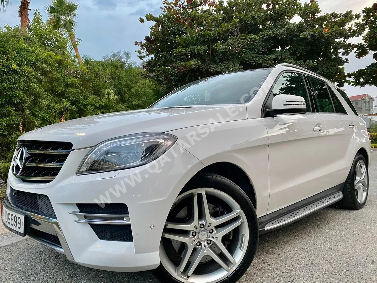 Mercedes-Benz  ML  400  2015  Automatic  66,071 Km  6 Cylinder  All Wheel Drive (AWD)  SUV  White