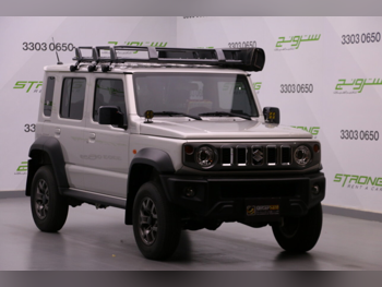 Suzuki  Jimny  2024  Automatic  15,000 Km  4 Cylinder  Four Wheel Drive (4WD)  SUV  Gray  With Warranty