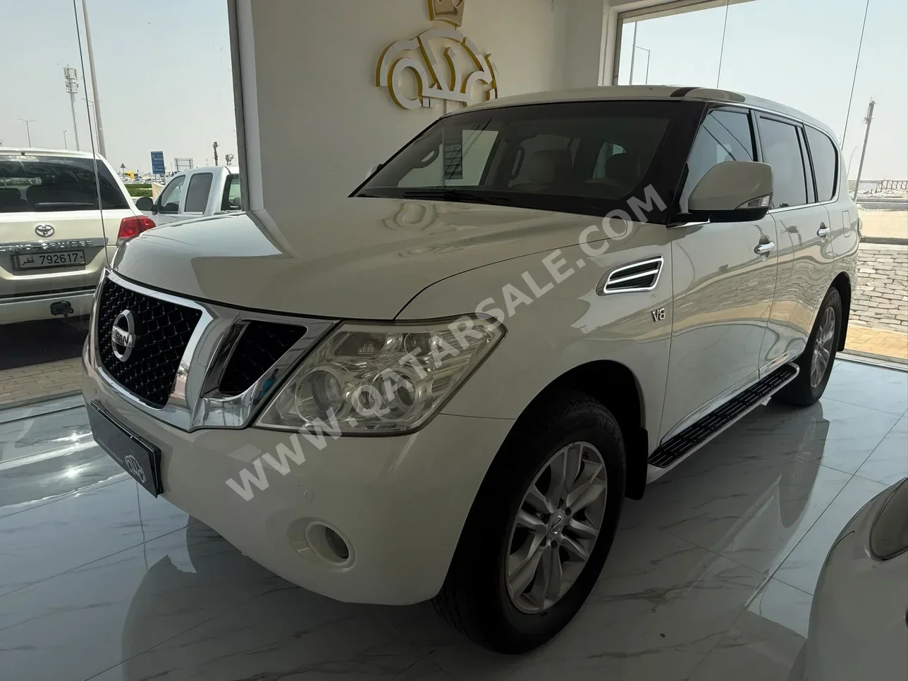 Nissan  Patrol  SE  2013  Automatic  292,000 Km  8 Cylinder  Four Wheel Drive (4WD)  SUV  White
