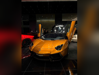 لمبرجيني أفانتادور ال بي 700 4 2014 اف - 1 41,000 كم 12 سلندر دفع كلي مستمر كوبيه \ سبورت فضي دخاني تحت الضمان