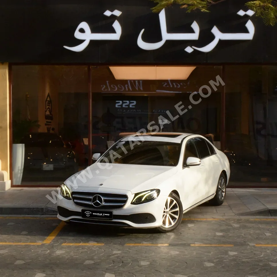 Mercedes-Benz  E-Class  200  2019  Automatic  121,000 Km  4 Cylinder  Rear Wheel Drive (RWD)  Sedan  White