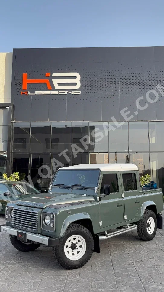 لاند روفر ديفيندر 110 2010 عادي 80,000 كم 4 سلندر دفع رباعي بيكب أخضر
