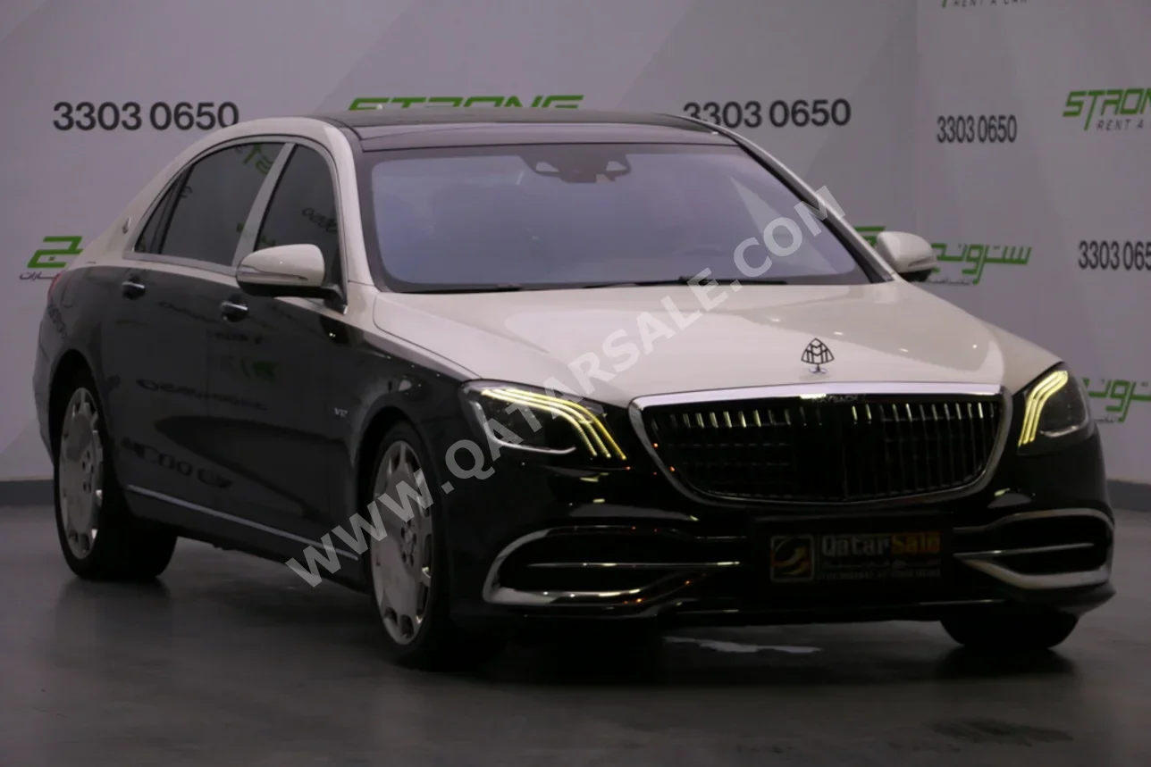 مرسيدس - بنز مايباخ S600 2016 اوتوماتيك 104,000 كم 12 سلندر دفع كلي مستمر سيدان أبيض و أسود