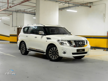 Nissan  Patrol  Platinum  2014  Automatic  319,800 Km  8 Cylinder  Four Wheel Drive (4WD)  SUV  White
