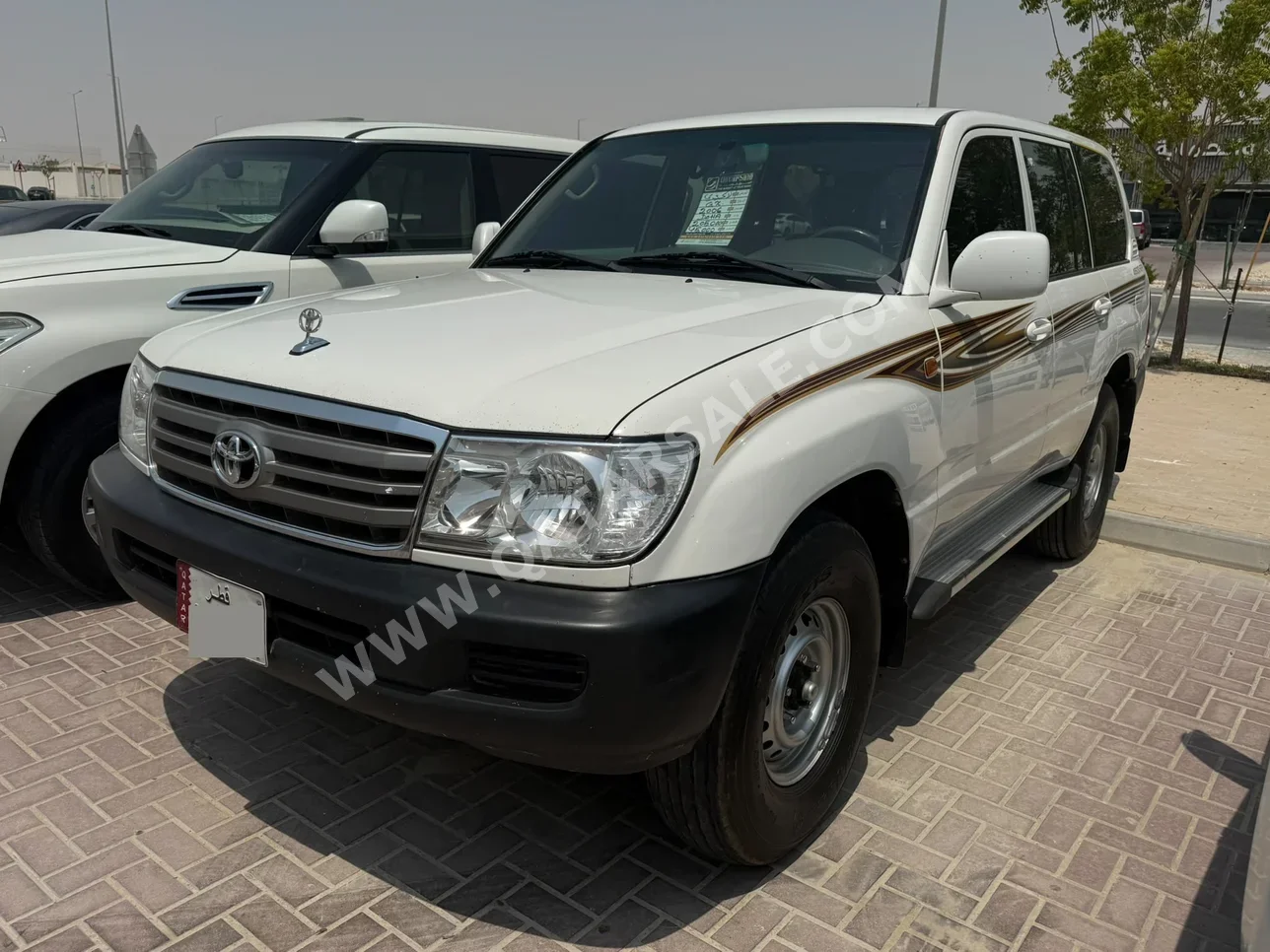 تويوتا لاند كروزر جي اكس 2006 عادي 205,000 كم 6 سلندر دفع رباعي اس يو في أبيض