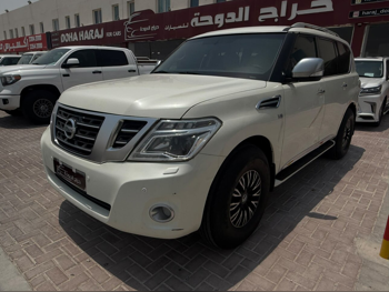 Nissan  Patrol  Platinum  2014  Automatic  498,000 Km  8 Cylinder  Four Wheel Drive (4WD)  SUV  White